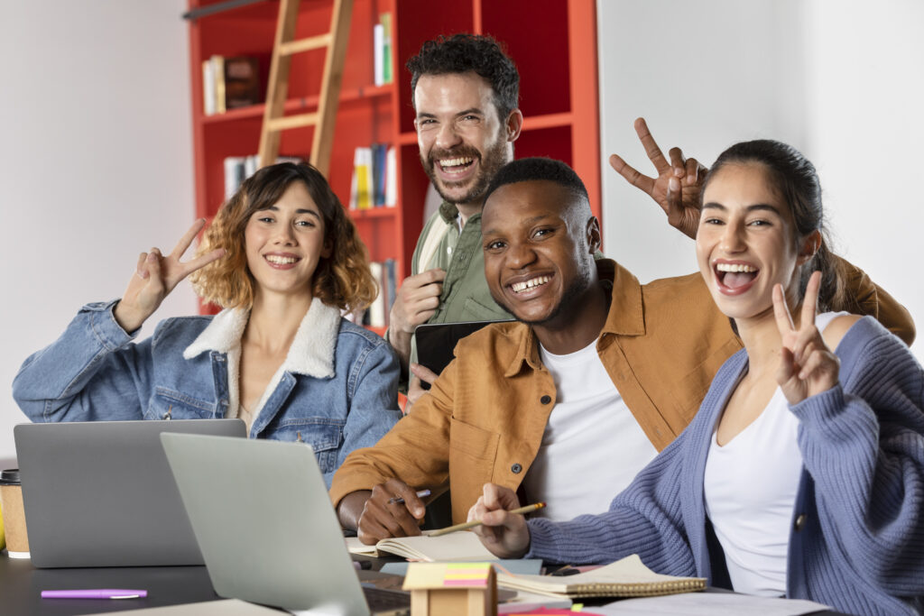 Diverse group of students successfully completing online courses