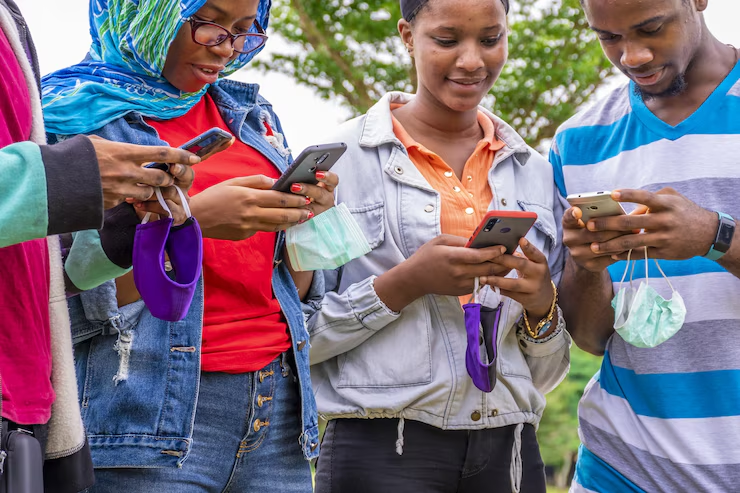 Students using mobile devices for learning in various settings