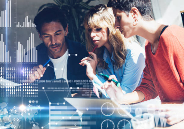 Tech team collaborating on a live MLOps dashboard
