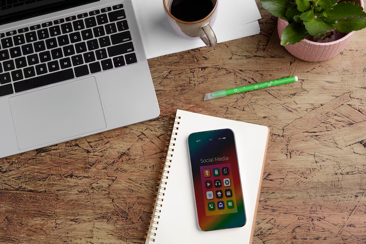 Speechify app open on iPhone and laptop