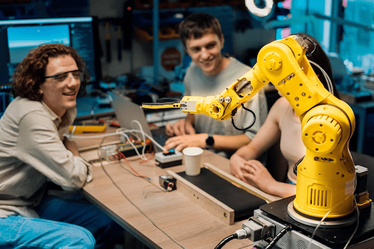Cobots in Action: Transforming Jobs Without Replacing People working alongside a human in a modern factory