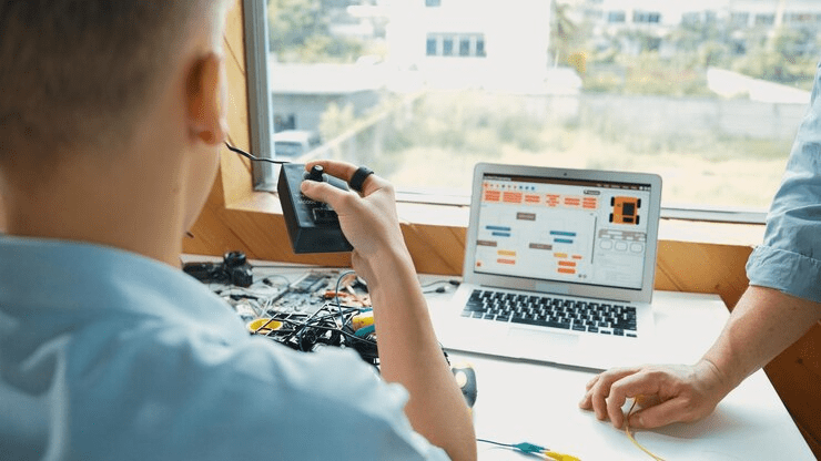 Software engineer running tests with automation tool